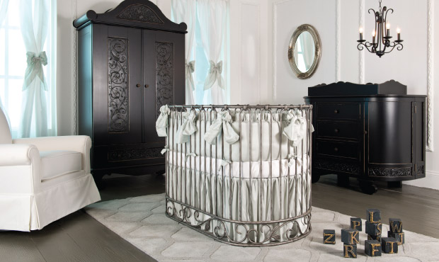 Quiet hues and the luxurious round iron crib define this beautiful baby room. This nursery will never go out of style and always whispers style and magic. 