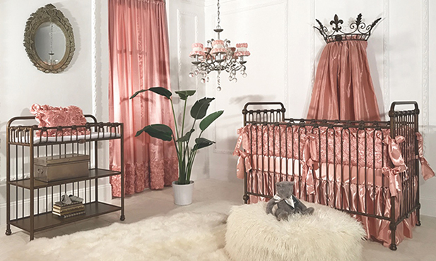 Bring the beauty of a rose garden into your nursery.  The silky pink roses work their magic in this simple yet sophisticated baby space. Paired with the furry texture of the rug and pouf, and this space beacons one to come and luxuriate.