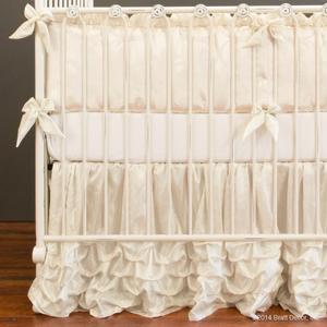 Made of grey sheepskin backed with ivory solid poly/cotton fabric. luxury crib bedding by bratt decor