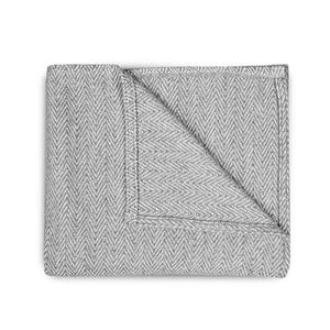 gray woven crib blanket